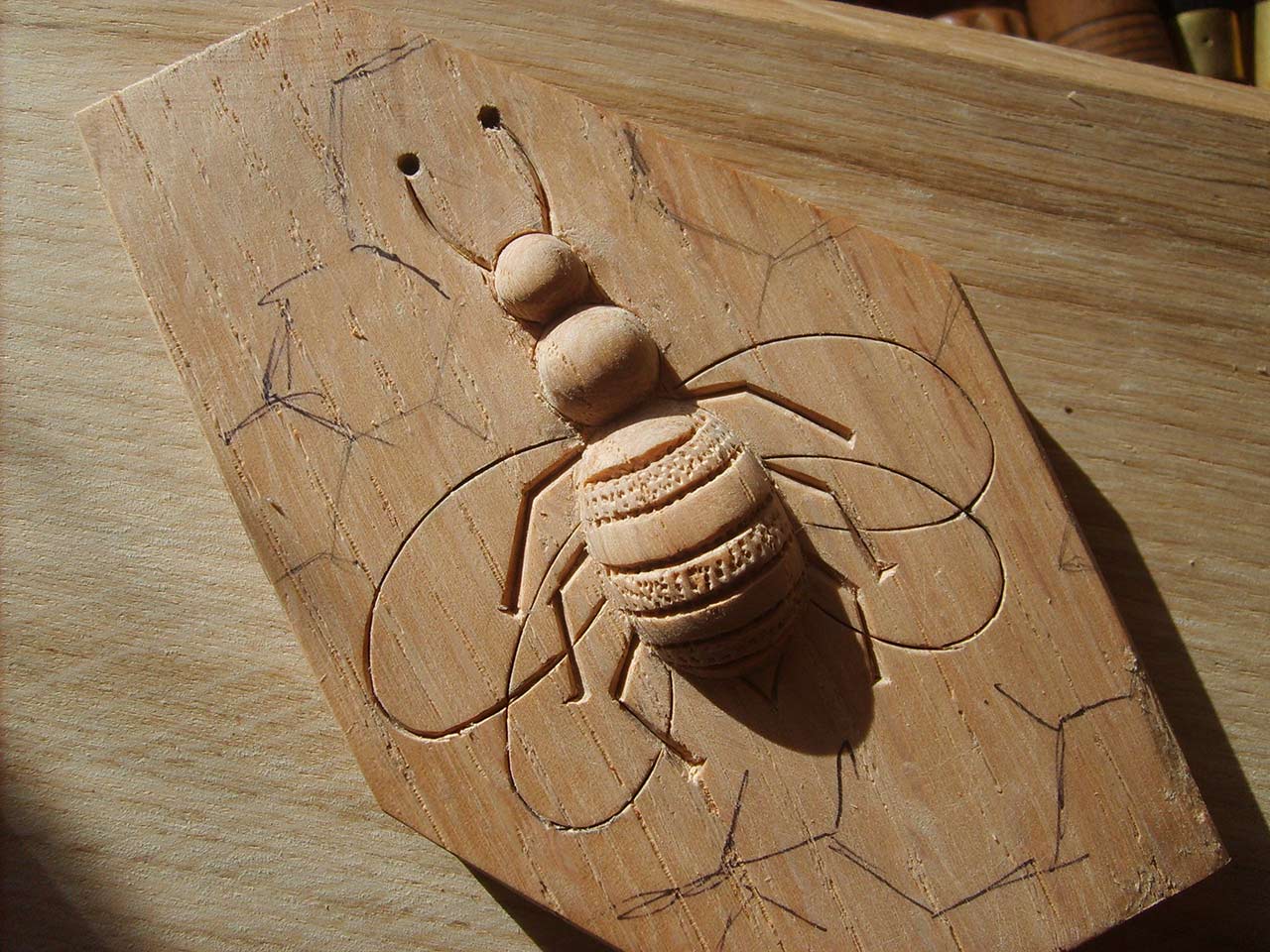 Part way through a bee carving