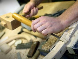 Hand making a chair