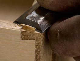 Hand finishing a drawer joint