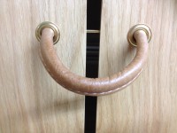 Shoe cabinet leather strap handle