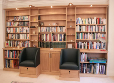 Large bookcase and reading chairs