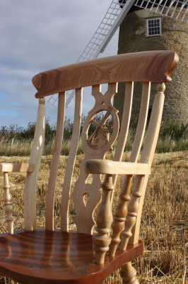 Carver chair with windmill motif